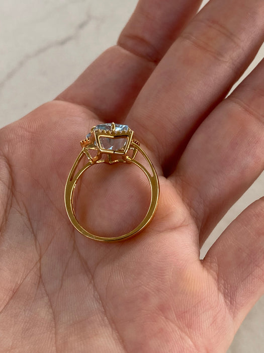18K Gold Blue Topaz & Diamond Star Halo Ring