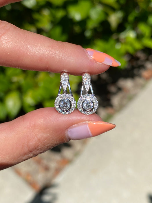 14k white gold diamond huggie earrings