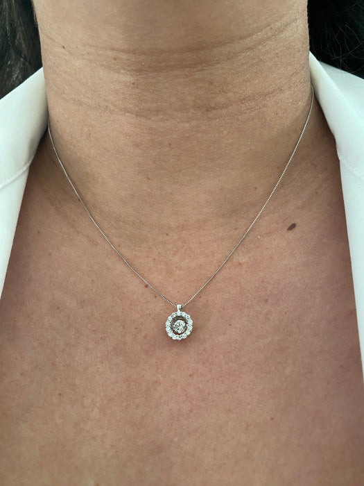 Platinum necklace with suspended diamond circle pendant 17.5”