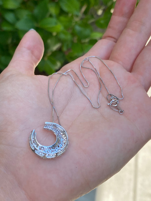 18k white gold box chain with 18k white gold baguette diamond crescent moon