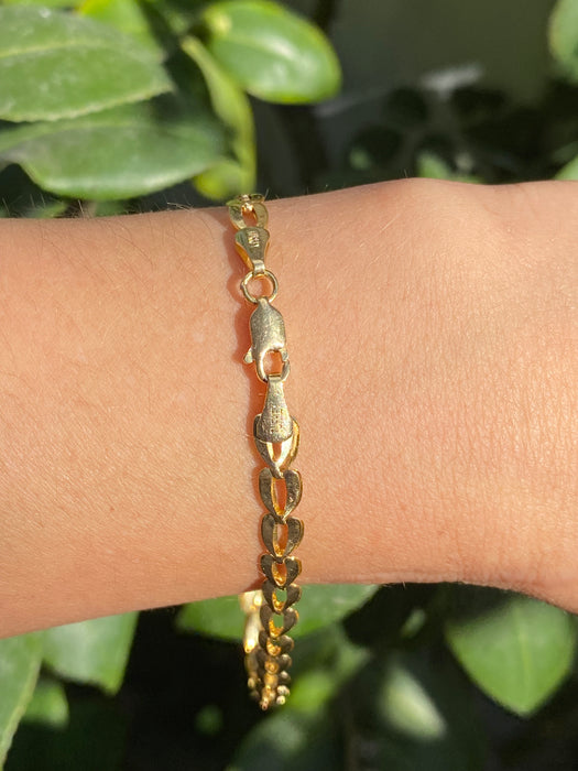 14k leaf heart bracelet 8.25”