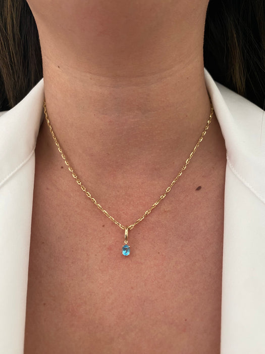 14k blue topaz charm