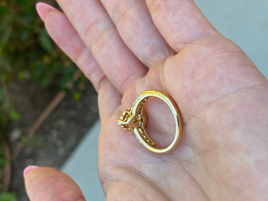 Vintage 18K Gold Ruby & Diamond Halo Ring