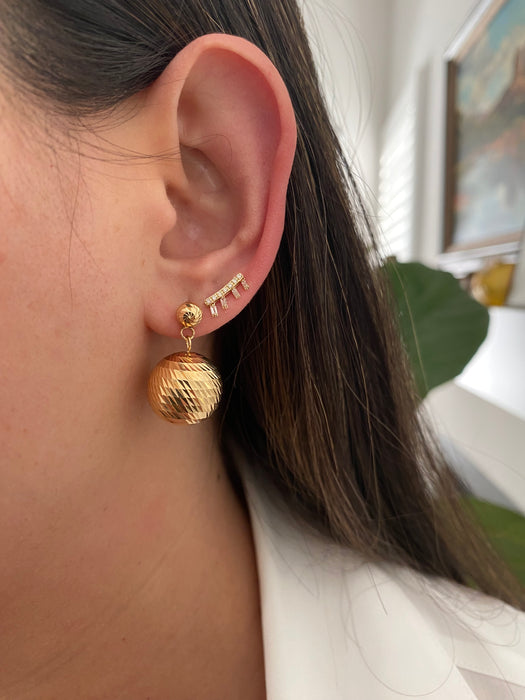 14k curved baguette diamond stud earrings