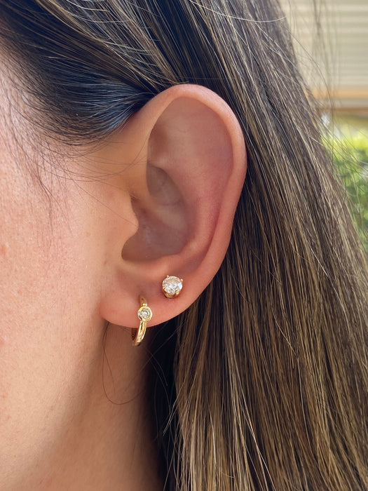 14k Gold Huggie Earrings with Bezel-Set Diamond – 0.10 CTW