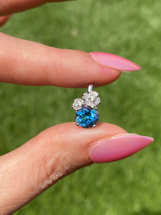 14k white gold blue topaz flower pendant