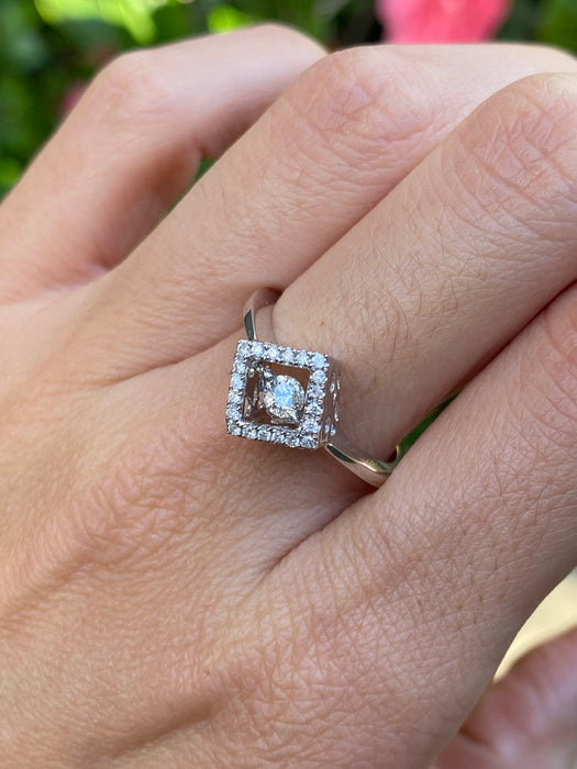 14k white gold dancing diamond ring size 6.75