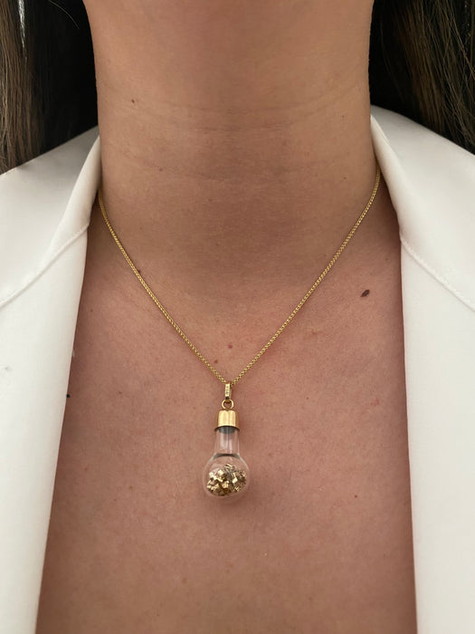 14k glass bottle with moving silver pieces inside charm pendant