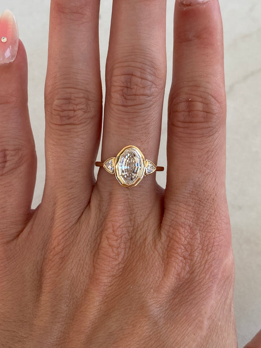 14K Gold Bezel Set Step-Cut Oval Lab Diamond Ring with Trillion Side Stones