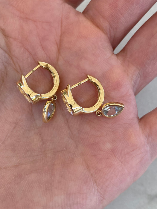 14K White & Blue Topaz Bezel Set Huggie Earrings