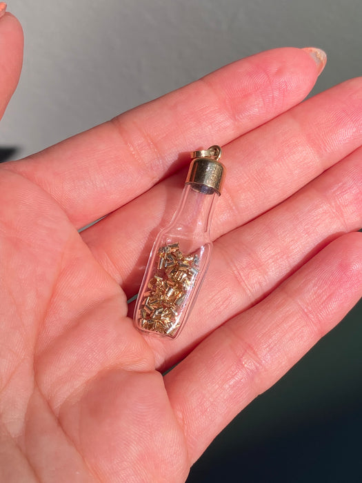 14k glass bottle with moving silver pieces inside charm pendant