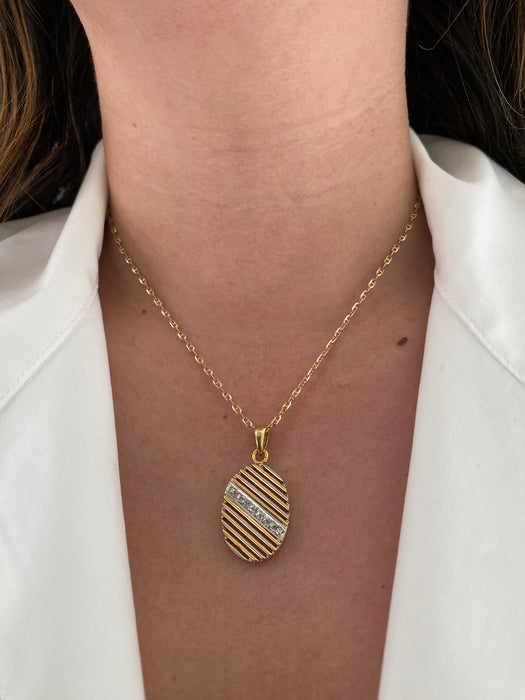 18k diamond oval two tone pendant