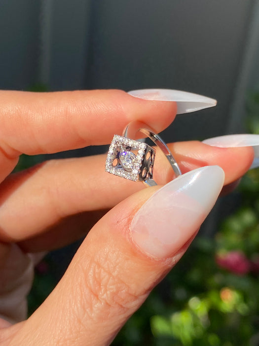 14k white gold dancing diamond ring size 6.75