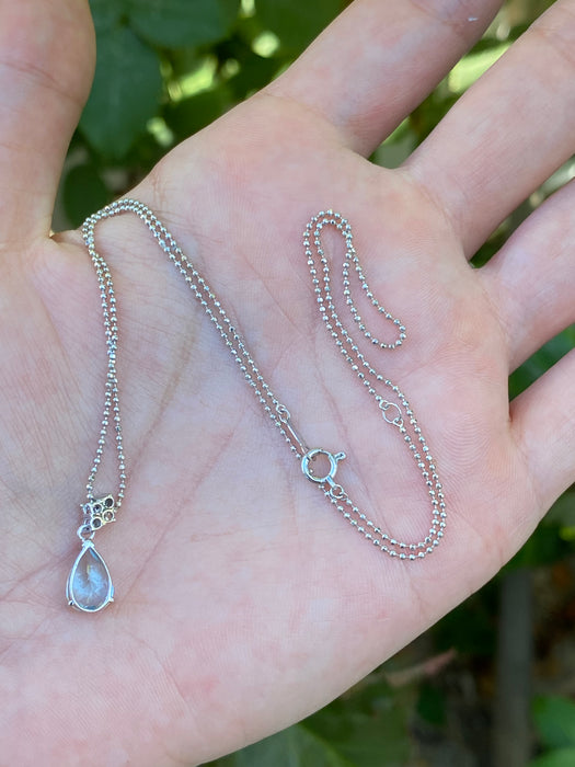 Platinum 900 aquamarine diamond pendant with 18k white gold bead chain