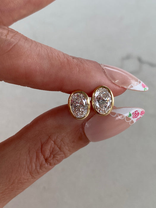 14K Gold 2.1 TCW Oval Cut Lab Diamond Bezel Stud Earrings