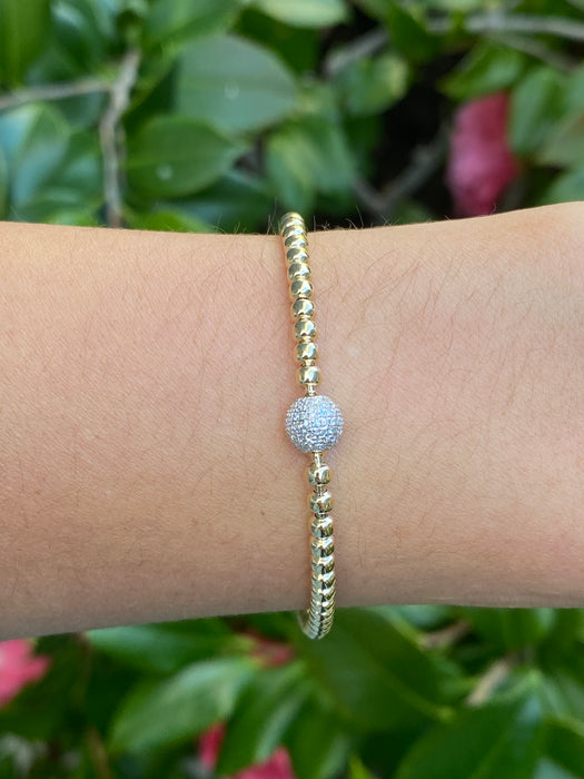 14k stretchy bead bracelet with diamond ball charm