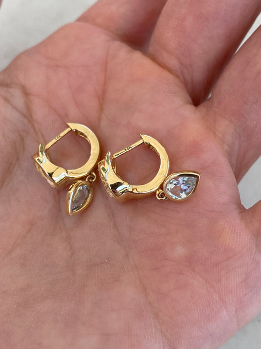 14K White & Blue Topaz Bezel Set Huggie Earrings