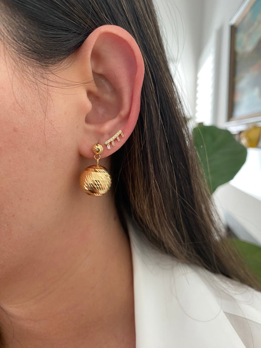 14k curved baguette diamond stud earrings