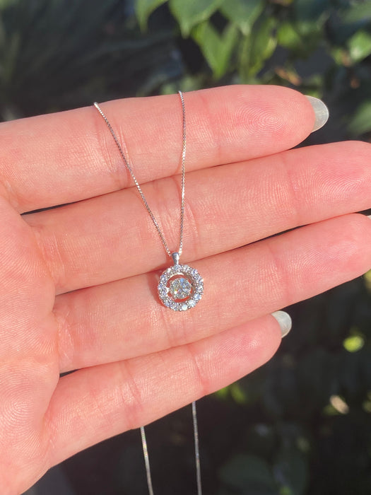 Platinum necklace with suspended diamond circle pendant 17.5”