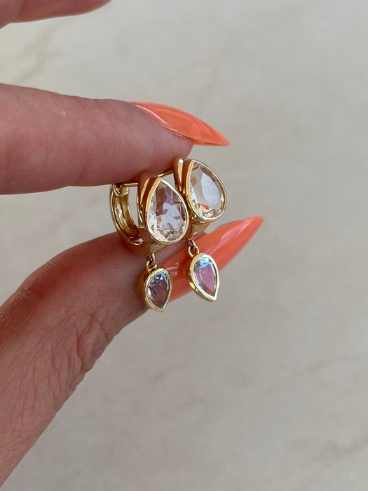 14K White & Blue Topaz Bezel Set Huggie Earrings