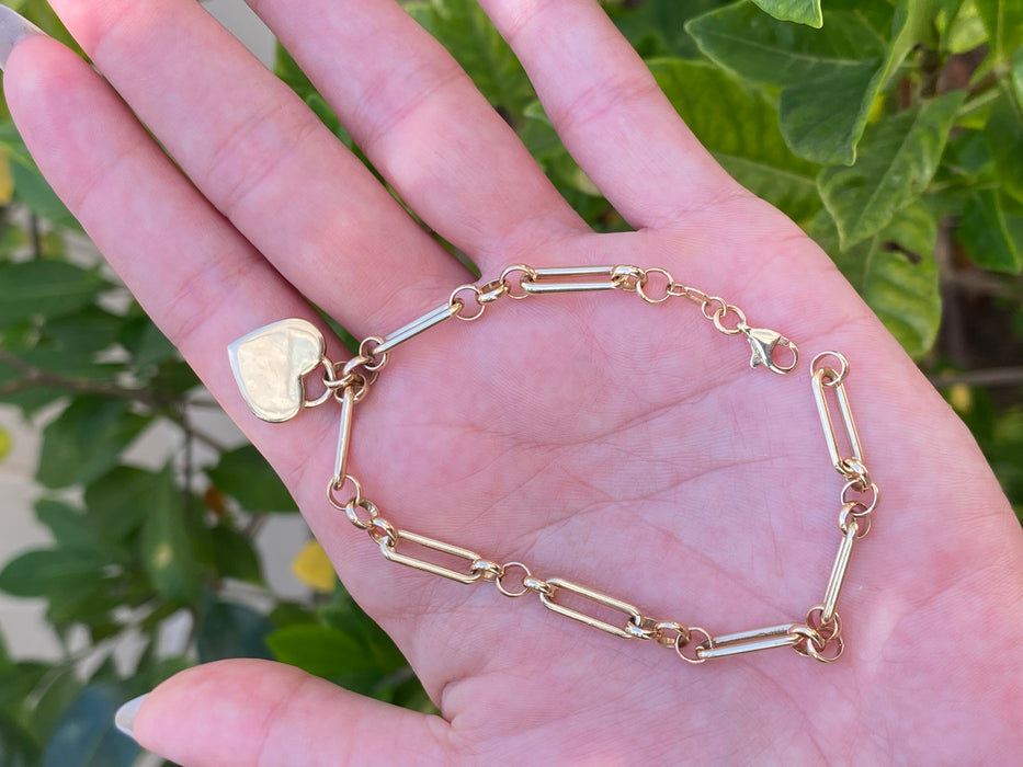 14k paperclip bracelet with heart charm 7.5”