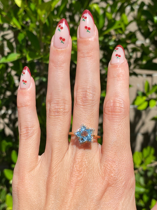 18K Gold Blue Topaz & Diamond Star Halo Ring