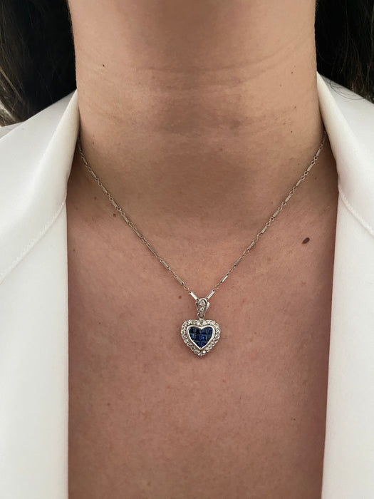 14k white gold diamond and blue sapphire heart pendant