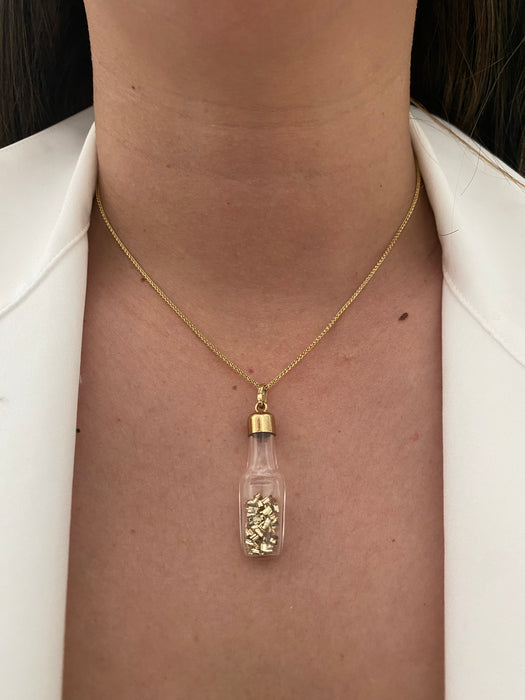 14k glass bottle with moving silver pieces inside charm pendant