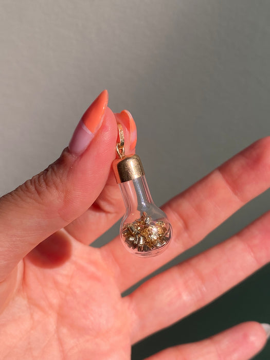 14k glass bottle with moving silver pieces inside charm pendant