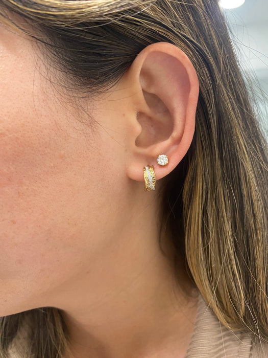 14K Gold Wavy Diamond Huggie Earrings
