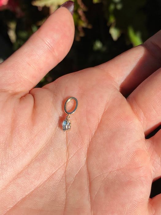 14k blue topaz charm