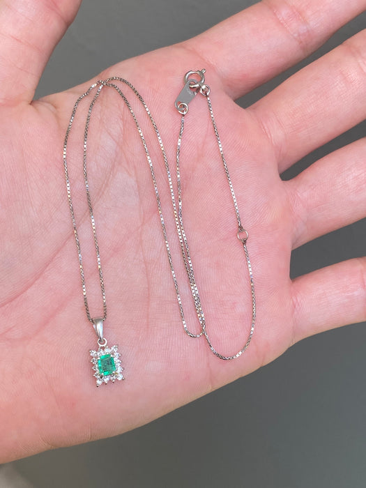 Platinum emerald and diamond pendant on chain