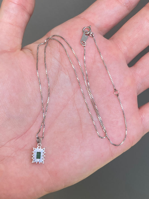 Platinum emerald and diamond pendant on chain