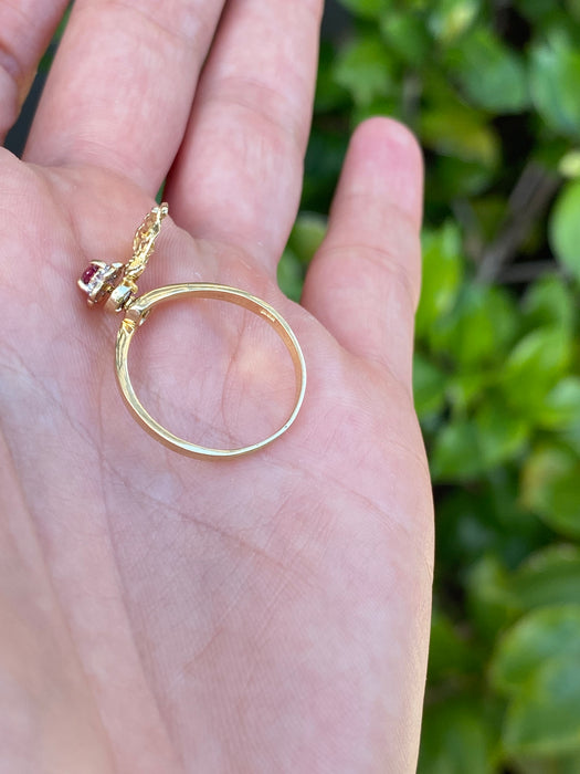 14k diamond spinner ruby ram flower ring size 7