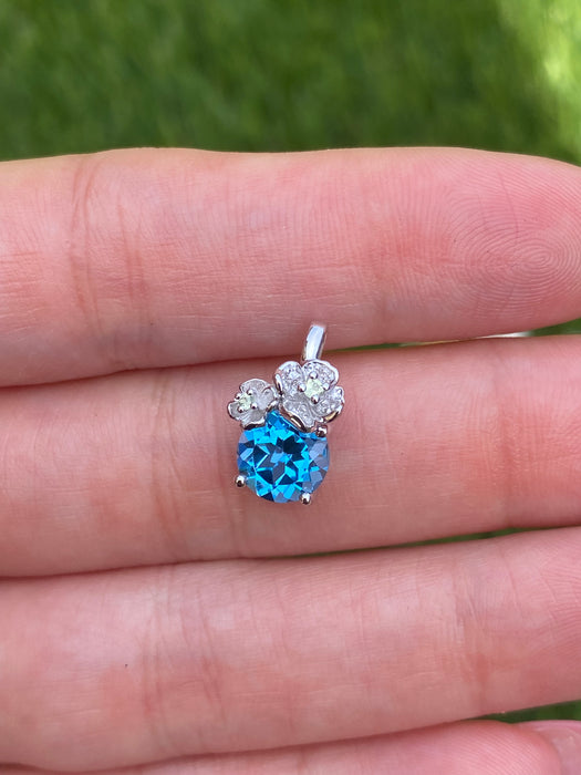 14k white gold blue topaz flower pendant