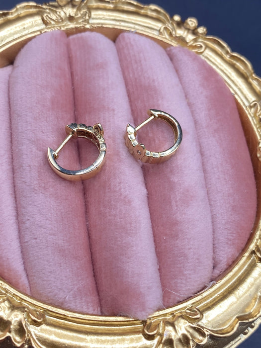 14k evil eye diamond Huggie earrings