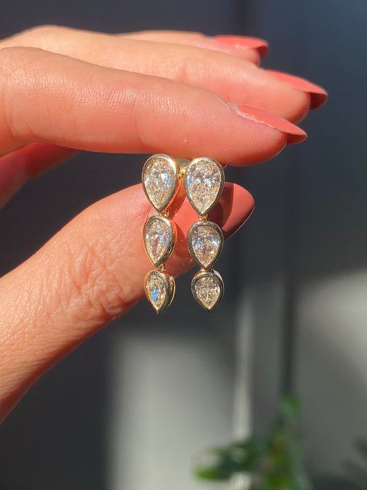 14k bezel set 3.3 carat lab diamond pear earrings