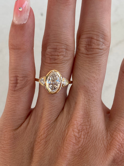14K Gold Bezel Set Step-Cut Oval Lab Diamond Ring with Trillion Side Stones