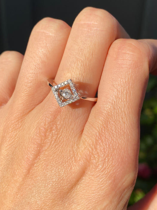 14k white gold dancing diamond ring size 6.75