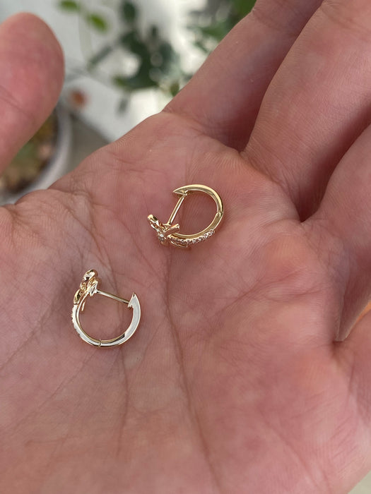 14k diamond bow huggie earrings