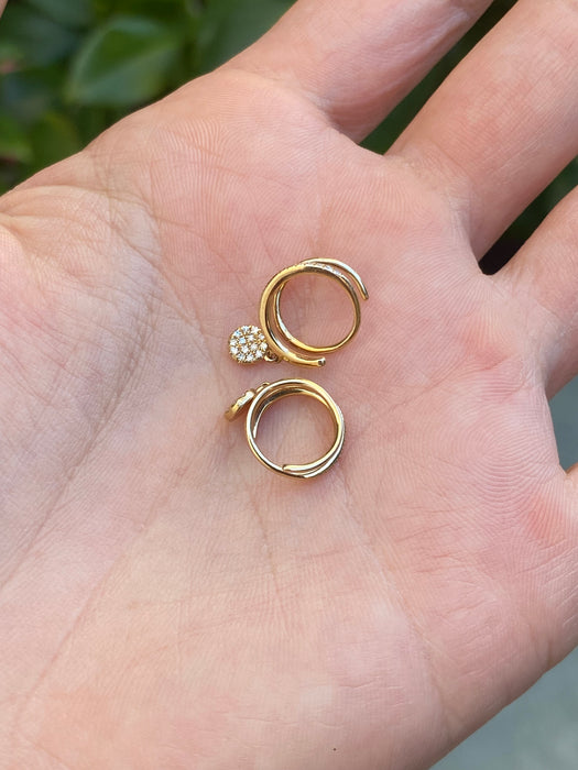 14k spiral diamond huggies