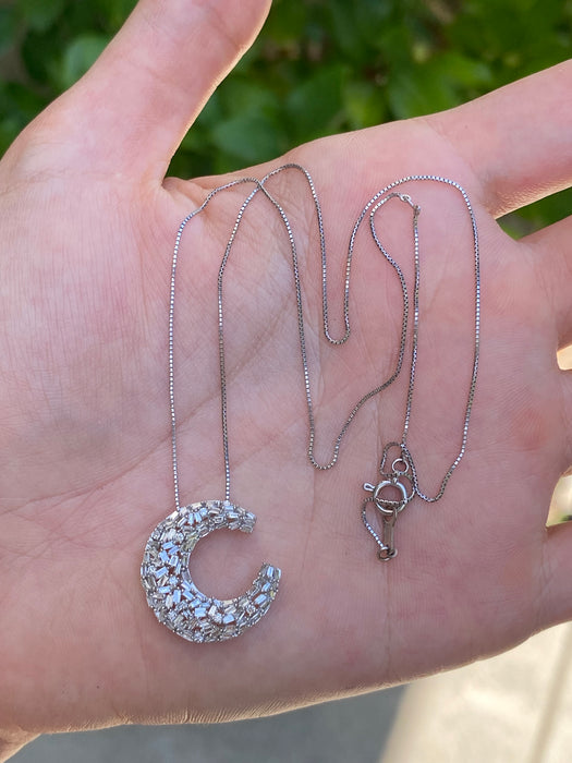 18k white gold box chain with 18k white gold baguette diamond crescent moon