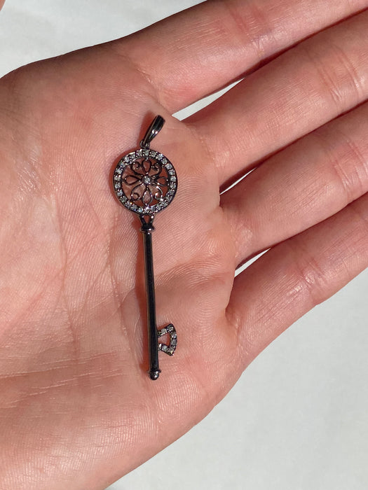 14k black rhodium flower diamond key pendant