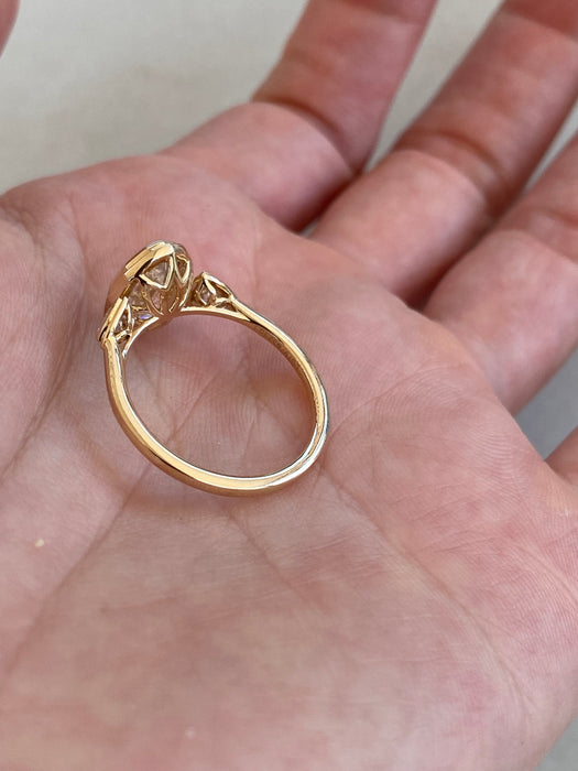 14K Gold Bezel Set Step-Cut Oval Lab Diamond Ring with Trillion Side Stones