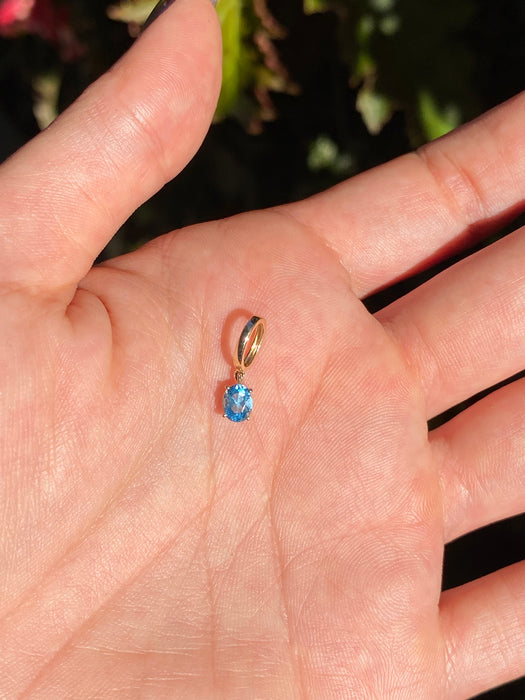 14k blue topaz charm
