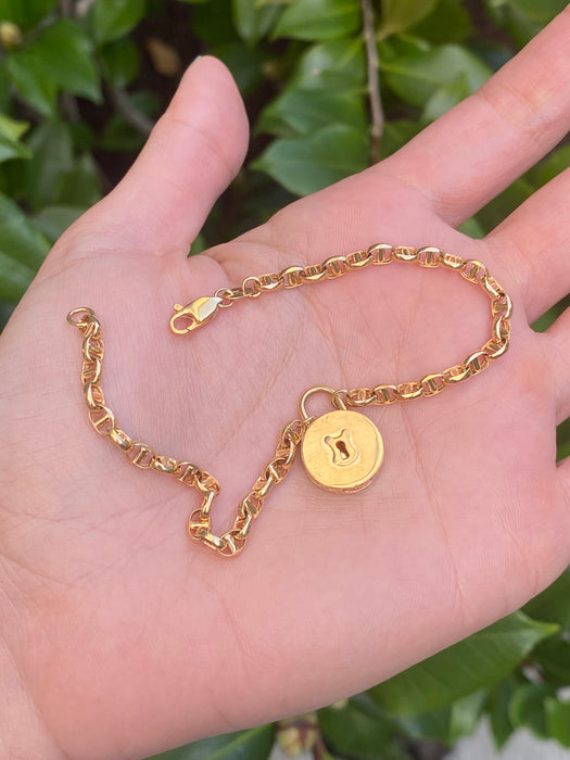 14k mariner bracelet with lock center