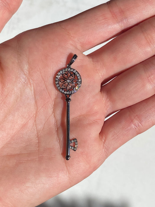 14k black rhodium flower diamond key pendant