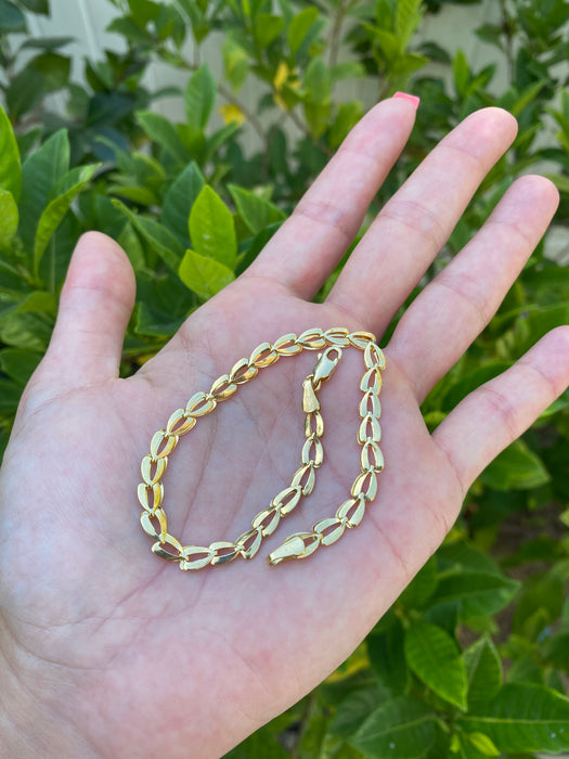 14k leaf heart bracelet 8.25”