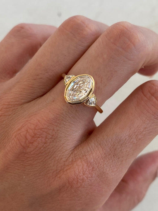 14K Gold Bezel Set Step-Cut Oval Lab Diamond Ring with Trillion Side Stones