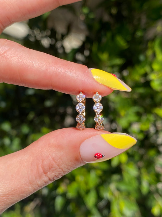 14K Gold Diamond Huggie Earrings – Floral Disc Design